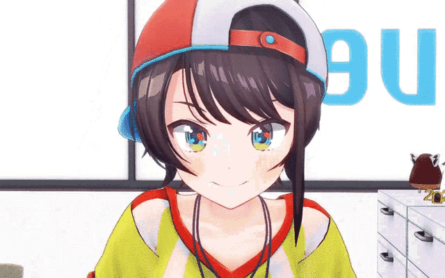 a girl wearing a red white and blue hat with the letter u on the wall behind her