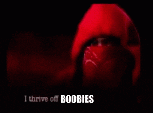 a man in a red hoodie is saying anything boobies i 'm for it