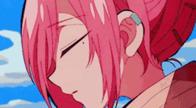 a close up of a pink haired anime character with a bandage on her ear