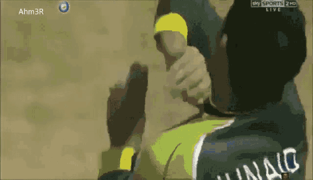 a man in a ronaldo jersey is being held by another man