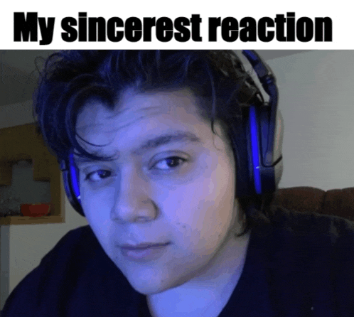 a man wearing headphones with the words " my sincerest reaction " above him
