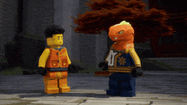two lego figures standing next to each other with one wearing a number 10