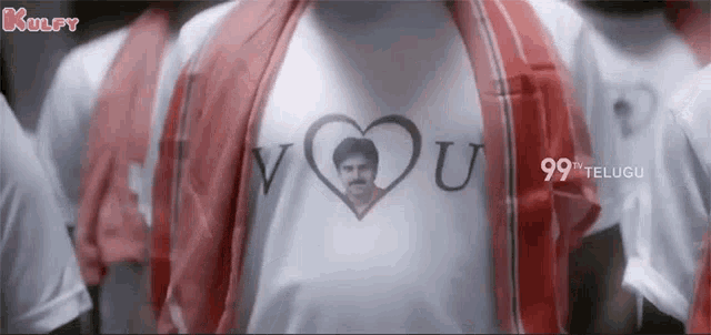 a man wearing a t-shirt with a picture of a man on it