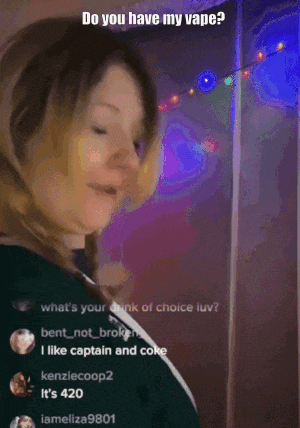 a woman says do you have my vape in front of christmas lights
