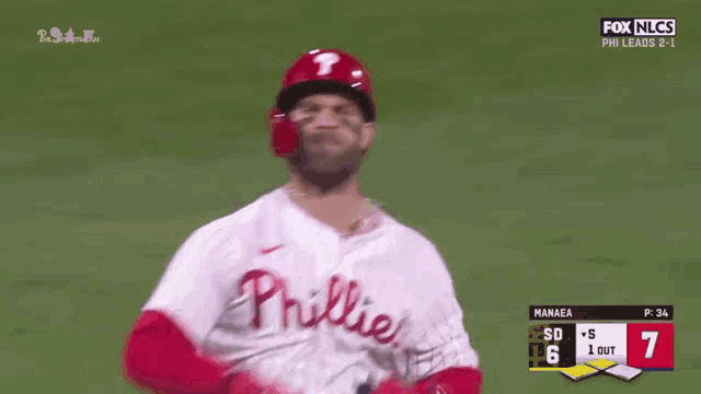 a phillies baseball player celebrates a home run