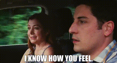a man and a woman are sitting in a car and the man is saying `` i know how you feel . ''