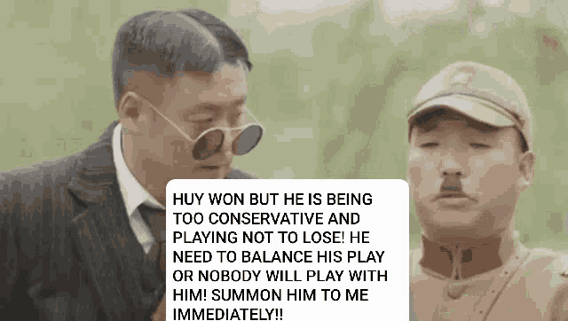 a man in a suit and tie is standing next to another man in a hat and sunglasses