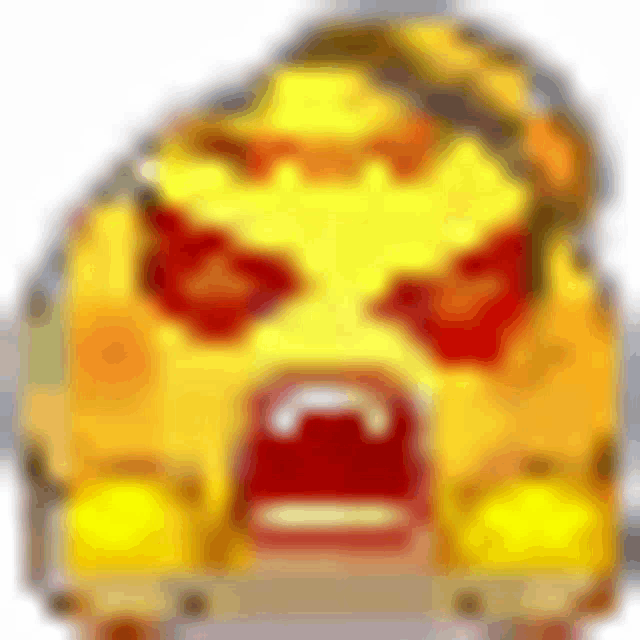 a yellow cartoon character with red eyes and a red mouth is angry .