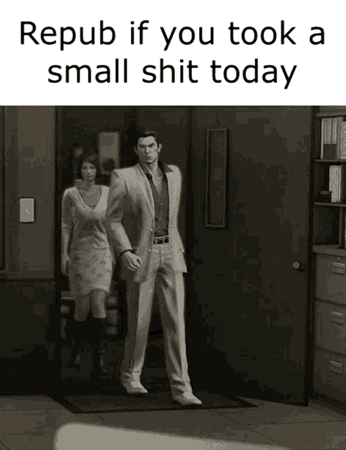a man in a suit is standing in front of a door with a woman standing behind him .