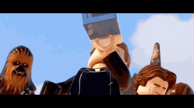 a lego character taking a picture of himself with chewbacca behind him
