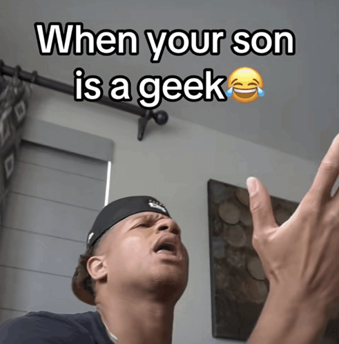 a man is crying with a caption that says when your son is a geek