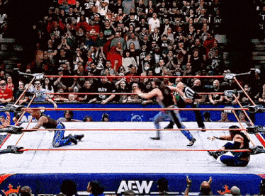 a wrestling ring with the word aew written on it