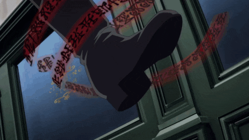 a person is standing in front of a door with chinese writing on the glass