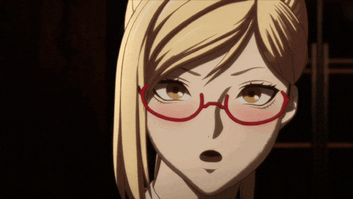 a close up of a woman wearing red glasses