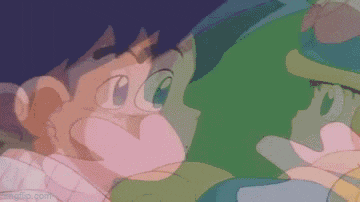 a cartoon of a boy and a girl kissing with a green background .