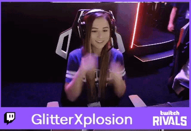 a girl wearing headphones is sitting in a chair in front of a banner that says glitterxplosion