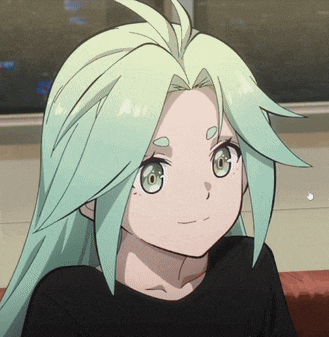 a girl with green hair is wearing a black shirt and smiling