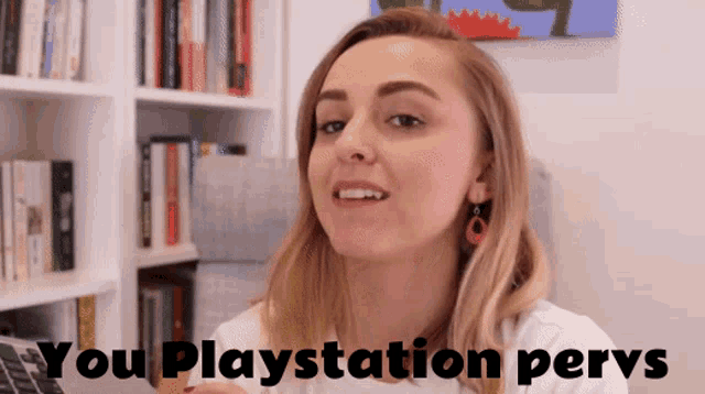 a woman says " you playstation pervs " in front of a book shelf