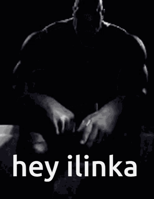 a black and white photo of a man with the words hey ilinka below him