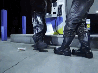 a person is standing in front of a gas pump that says diesel