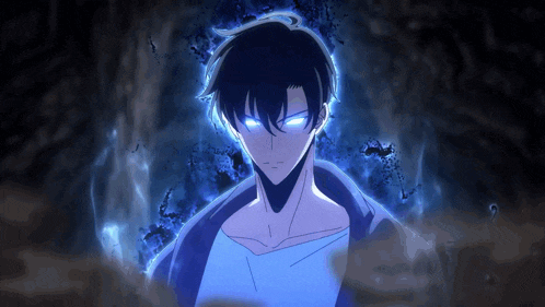 a man with blue eyes stands in a dark cave