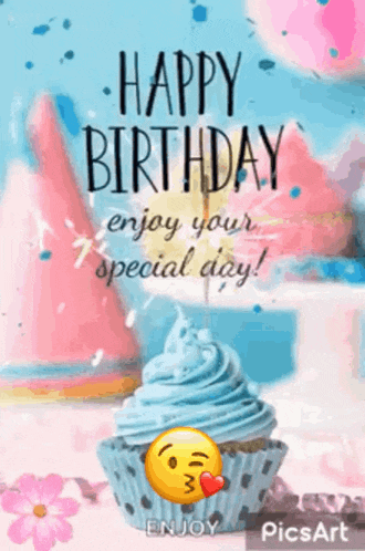 a birthday card with a cupcake and a smiley face on it