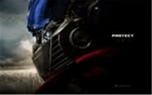 a close up of a robot 's head with a helmet on .