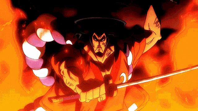 a man in a samurai costume is holding a sword in front of a fire background .