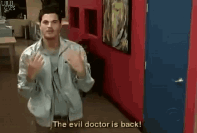 a man says the evil doctor is back while standing in a room