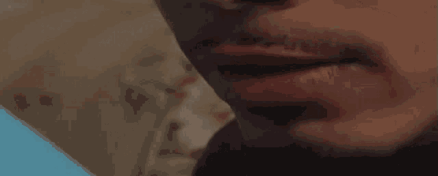 a close up of a man 's face with the word live written above it