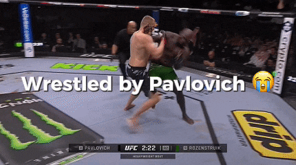 a ufc fighter is wrestled by pavlovich during a match