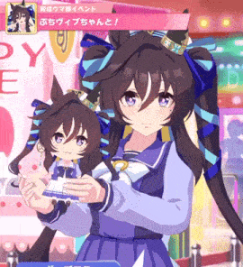 a girl is holding a stuffed animal in front of a sign that says dy