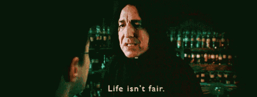 a man is talking to another man with the words life is n't fair