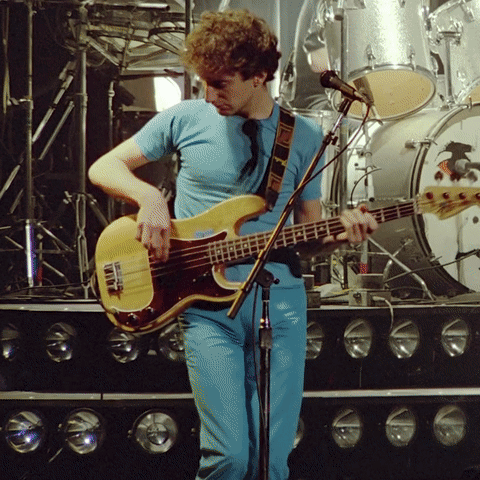 John Deacon Playing Guitar GIF - John Deacon Playing Guitar Queen GIFs