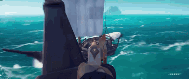 a screenshot of a video game shows a boat with a sail in the ocean