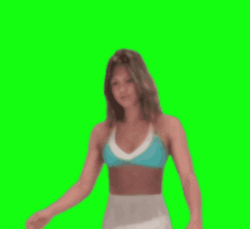 a woman in a bikini top and white shorts is dancing in front of a green screen .