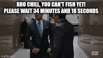 a man in a suit and tie is talking to another man in a suit .