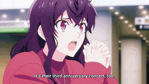 a girl with purple hair is talking about their third anniversary concert