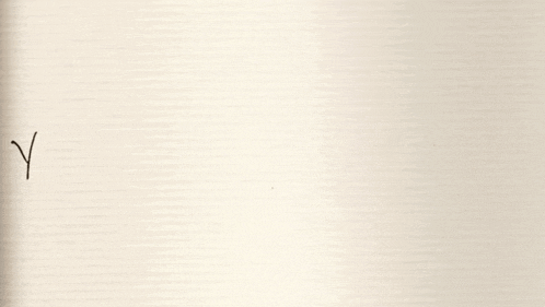 the letter y is written in black ink on a piece of paper .