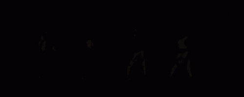 a group of women are dancing on a stage in front of a blackpink banner .