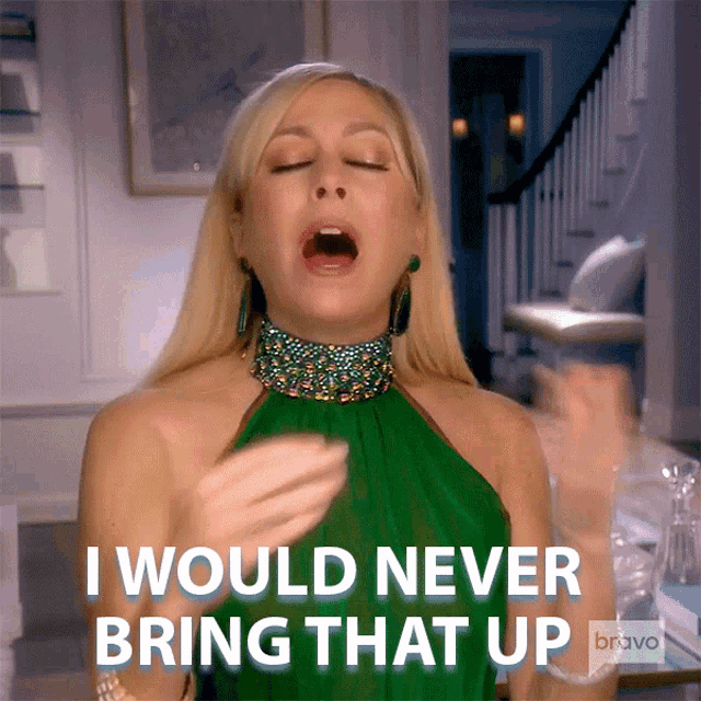 a woman in a green dress says i would never bring that up bravo