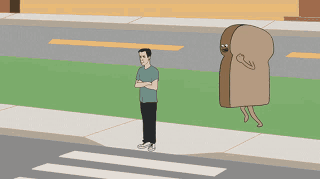 a man standing next to two slices of bread with faces