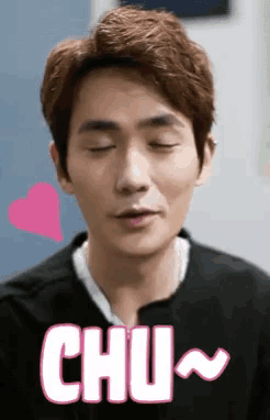 a man with his eyes closed and the word chu written on his face