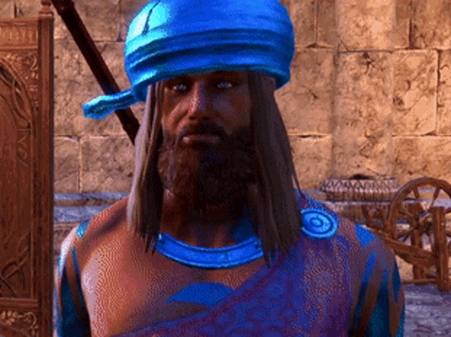 a man with a beard wearing a blue turban in a video game