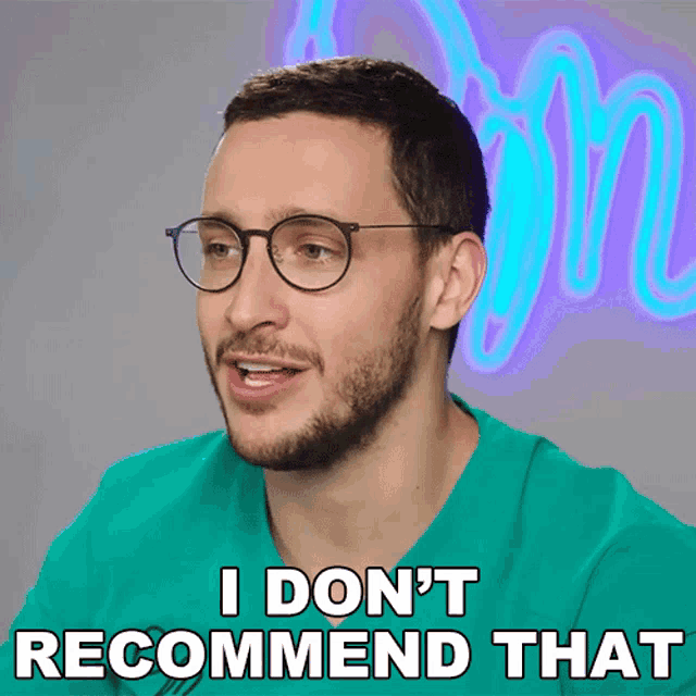 a man wearing glasses and a green shirt says i do n't recommend that