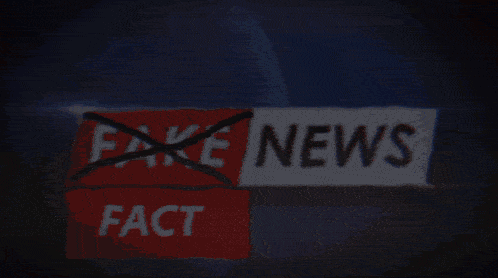 a red and white sign that says fake news and fact on it