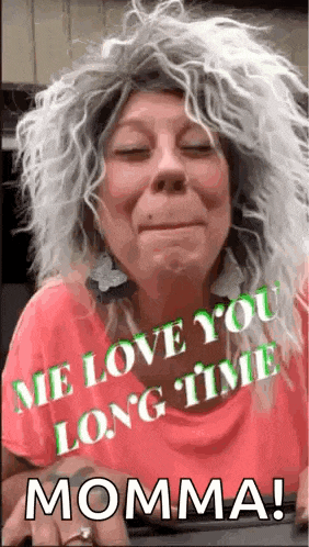 a woman is wearing a wig and earrings and says `` me love you long time momma ! ''
