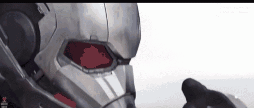 a close up of an ant man 's helmet and gloves