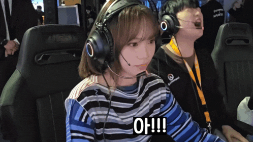 a woman wearing a headset says oh !!!