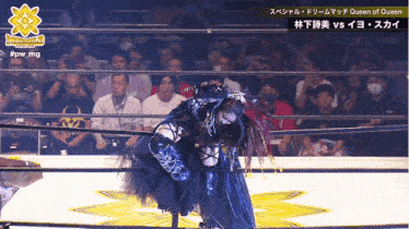 a wrestling match between queen of queen and a foreign wrestler